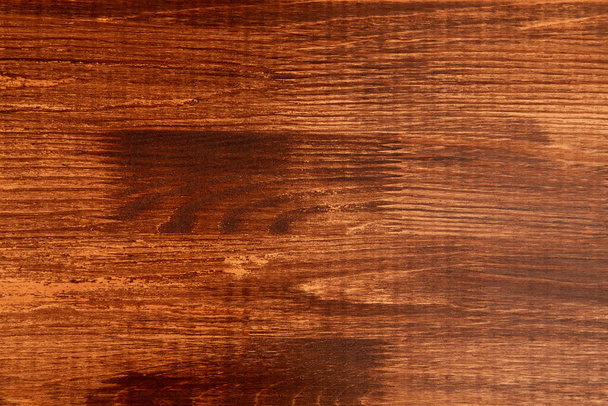 Σκούρο ξύλινο φόντο υφή. Επιφάνεια ξύλου, θέση για κείμενο. Κάτοψη της ξύλινης βερνικωμένης σανίδας με φόντο, αντιγραφή χώρου - Φωτογραφία, εικόνα