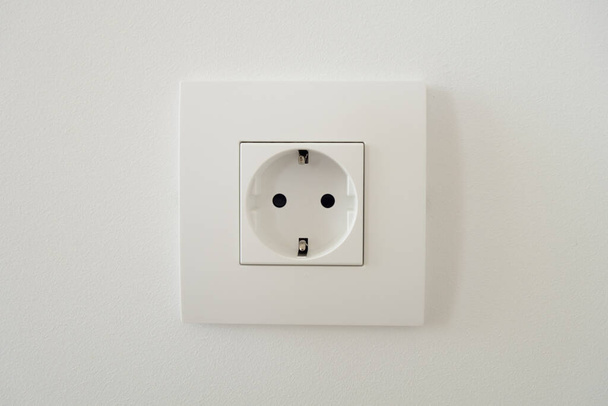 The socket is white EU standard with grounding - Fotoğraf, Görsel