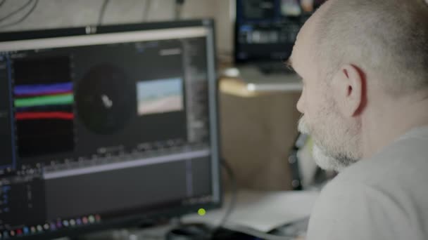 Mature Man Video Editor Retouching - Footage, Video