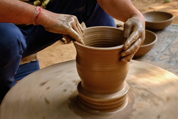 Indian potter hands at work, Shilpagram, Udaipur, Rajasthan, India - Photo, Image