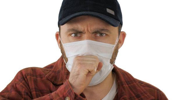 American farmer in medical mask coughing on white background. - Fotografie, Obrázek