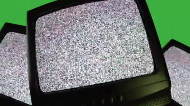 Old retro TV screen with noise interference on green background, vintage television turning on and off monitor, blinking screen concept. Isolated vintage TV - Footage, Video