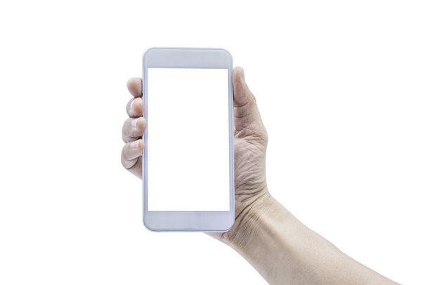 白い背景にクリッピングパスで隔離されたモックアップのための空白の白い画面表示と白い携帯電話のスマートフォンを保持している男の手のクローズアップショット。携帯電話技術とデジタル現代. - 写真・画像