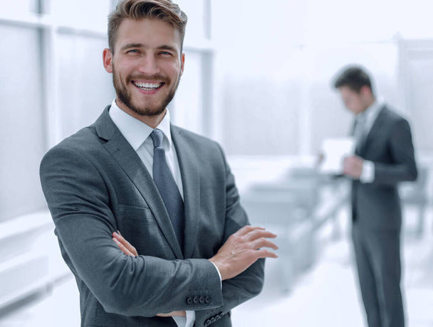 successful businessman on the background of the office - Φωτογραφία, εικόνα