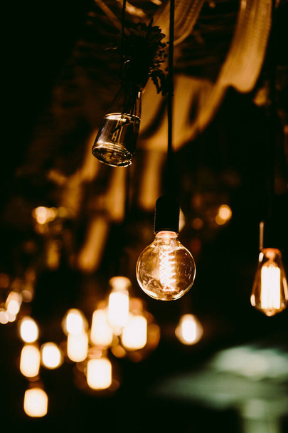 vintage light bulbs in bar. Light bulbs background - Photo, image