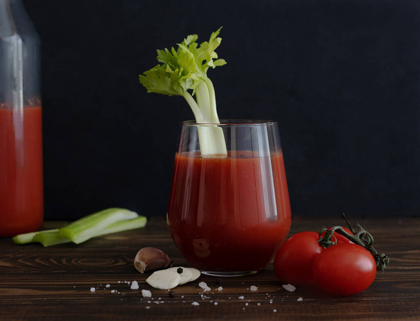 Tomato juice with vegetables, black pepper and salt - Фото, зображення