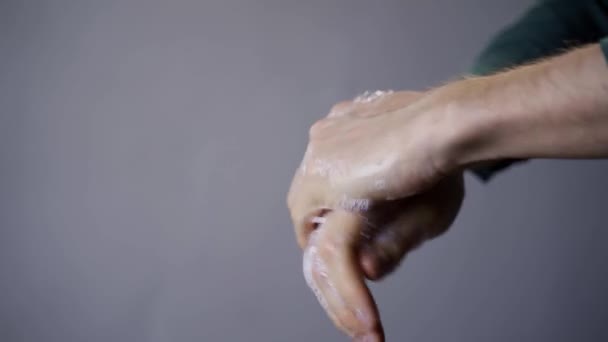 Prevention of a virus pandemic thoroughly wash your hands with hot water and soap rubbing for at least thirty seconds - Filmati, video