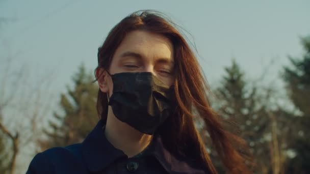 Sick female in medical mask during coronavirus epidemic - Video, Çekim