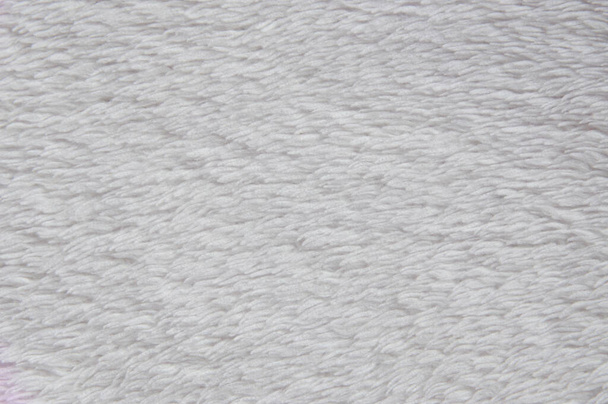 Weiße weiche Decke Stoff Textur Nahaufnahme als Hintergrund - Foto, Bild
