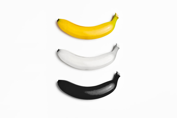 Yellow white and black Banana set on white background. Not an illustration.High-resolution photo. - Φωτογραφία, εικόνα