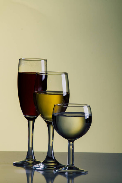 three wine glasses with different beverages - Photo, Image