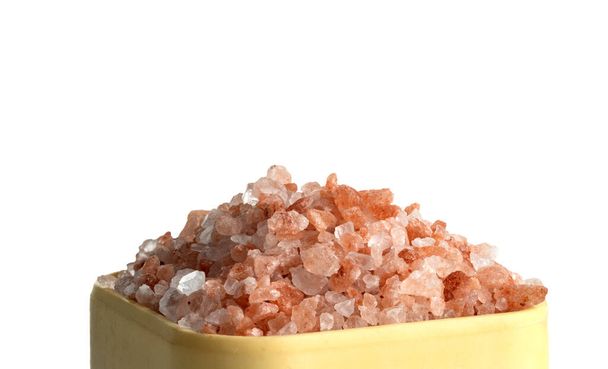 Pink Himalaya salt in a salt shaker. Isolated on a white background. - Photo, Image