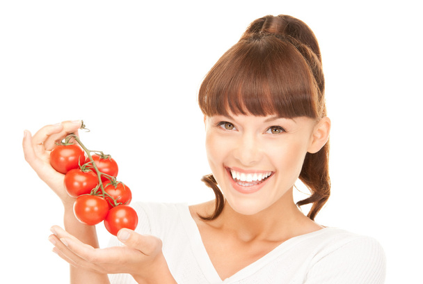 Woman with ripe tomatoes - Foto, Bild