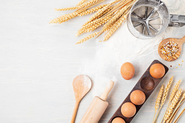 Baking ingredients and kitchen utensils flat lay. Healthy eating, home cooking, baking recipes, online cooking blog and classes concept. Top view - Foto, Imagem