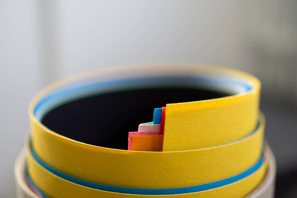 Close up of colored bright quilling paper curves. - Fotó, kép