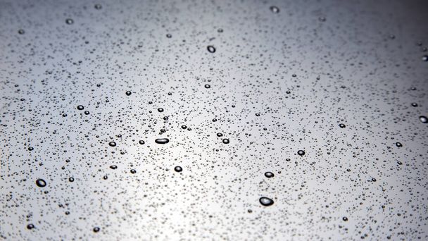 small drops of water on a plastic surface. texture and abstract backgroun - Foto, Bild