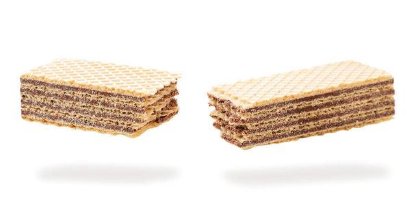 Wafers with chocolate fly on a white background. Isolated - Photo, Image