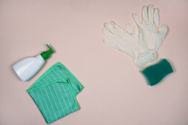 Concept of cleaning. Soap, medical gloves, rag, sponge. - Zdjęcie, obraz