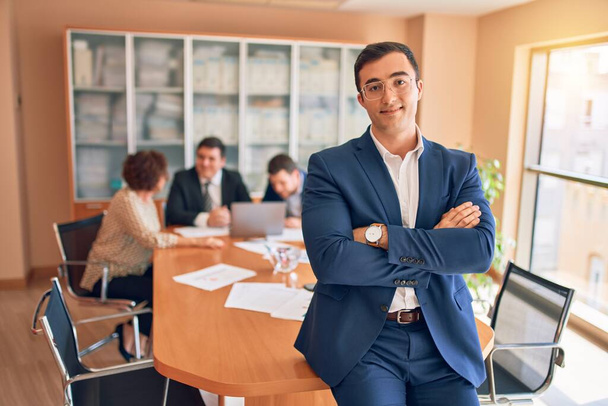 Business lawyers workers meeting at law firm office. Professional executive partners working on finance strategry at the workplace. Leader worker standing confident looking at the camera. - Foto, Imagen