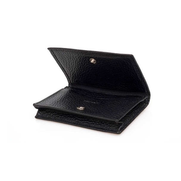 Porte-cartes de visite en cuir noir isolé sur fond noir
 - Photo, image