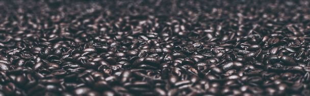 Roasted dark coffee beans background  - Photo, Image