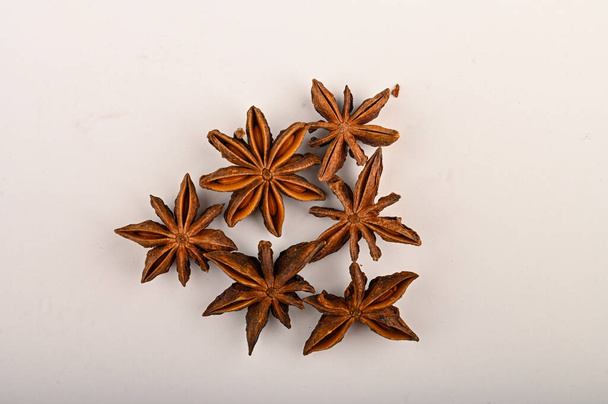 Several star anise inflorescences on a white background. Close up - Photo, Image