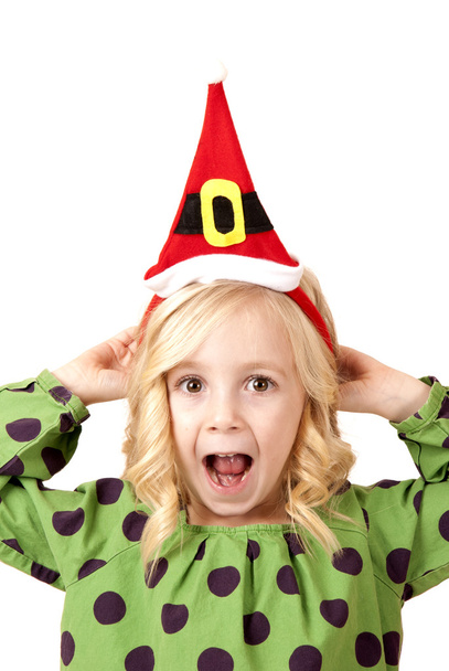 adorable fun blond girl wearing a santa hat - Foto, immagini