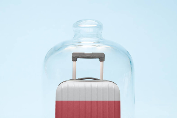 Suitcase with Poland flag design in quarantine minimal creative coronavirus travel restriction concept. - Photo, image