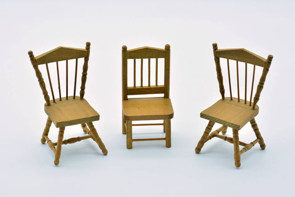 Three wooden chairs isolated on white background - Photo, Image