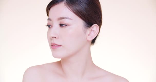 primer plano asiático joven belleza con limpio fresco piel
 - Imágenes, Vídeo