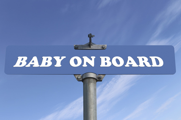 baby aan boord van verkeersbord - Foto, afbeelding
