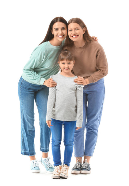 Happy lesbian couple with little adopted girl on white background - Φωτογραφία, εικόνα