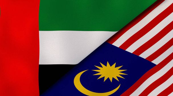 Zwei Staaten Flaggen der Vereinigten Arabischen Emirate und Malaysia. Hochwertiger geschäftlicher Hintergrund. 3D-Illustration - Foto, Bild