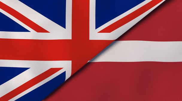 イギリスとラトビアの2つの州旗。高品質のビジネス背景。3Dイラスト - 写真・画像