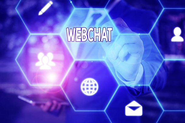 Sinal de texto mostrando Webchat. Sistema de fotos conceitual que permite aos usuários se comunicar em tempo real usando a internet
. - Foto, Imagem