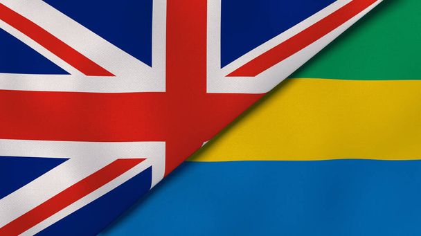 Dvě vlajky Spojeného království a Gabonu. Vysoce kvalitní obchodní zázemí. 3D ilustrace - Fotografie, Obrázek