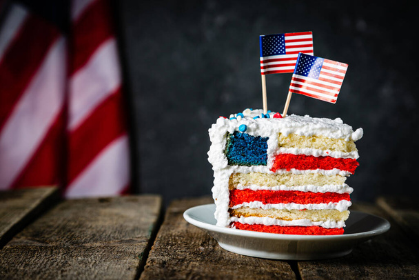 American national holidays concept - 4th of July, Memorial Day, Labour Day. Layered spounge cake in USA flag colours - Photo, Image