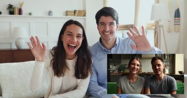 Two young family couples talking video calling from home - Footage, Video