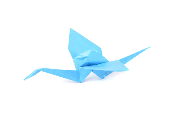 Origami kraan geïsoleerd over witte achtergrond - Foto, afbeelding