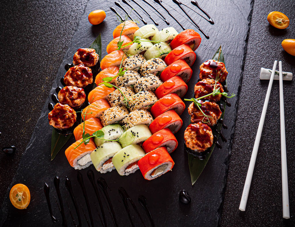 sushi set on the black background - Foto, Imagem