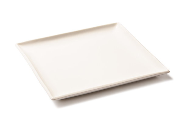 Placa rectangular vacía blanca de porcelana sobre un fondo blanco
 - Foto, Imagen