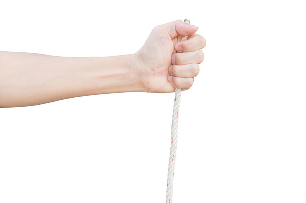 Рука людини тримає мотузку ізольовано на білому тлі. з відсічним контуром
. - Фото, зображення