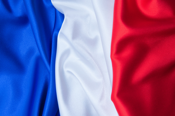 Прапор Франції на тему атласної текстури. - Фото, зображення