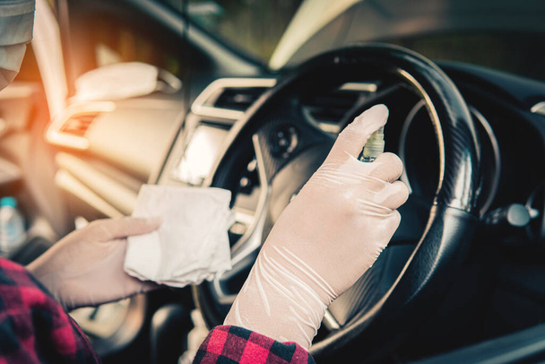 Disinfection of car, covid-19 Coronavirus Disease 2019, healthcare at vehicle. - Foto, Imagen