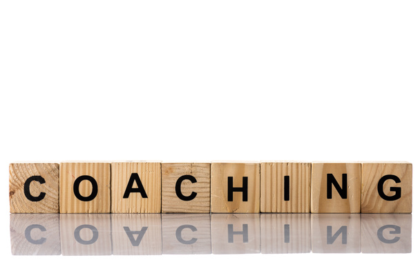 Wooden cubes with coaching lettering on white - Photo, Image