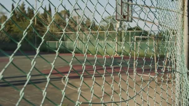 Abandoned and neglected basketball court due to corona virus outbreak - Filmmaterial, Video