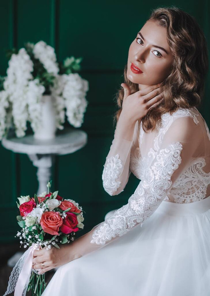 Beautiful young bride in white wedding dress posing   - Photo, image