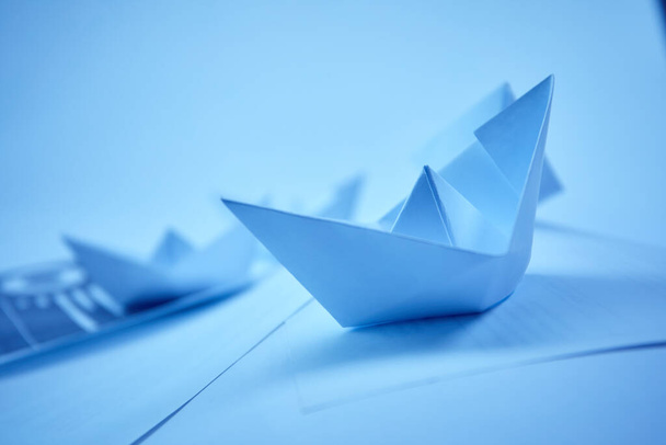 paper boats on documents, business concept  - Photo, Image