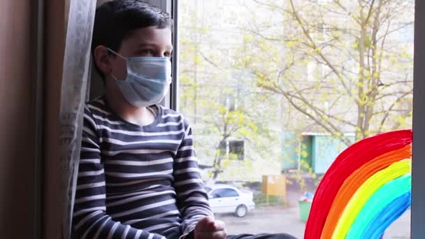 Quarantine. Self isolation. The boy will take off the mask. End of quarantine. Joy. Rainbow - Footage, Video