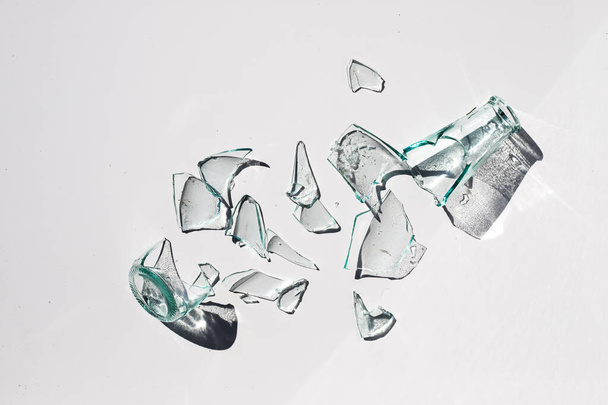 broken bottle on a white background - Φωτογραφία, εικόνα